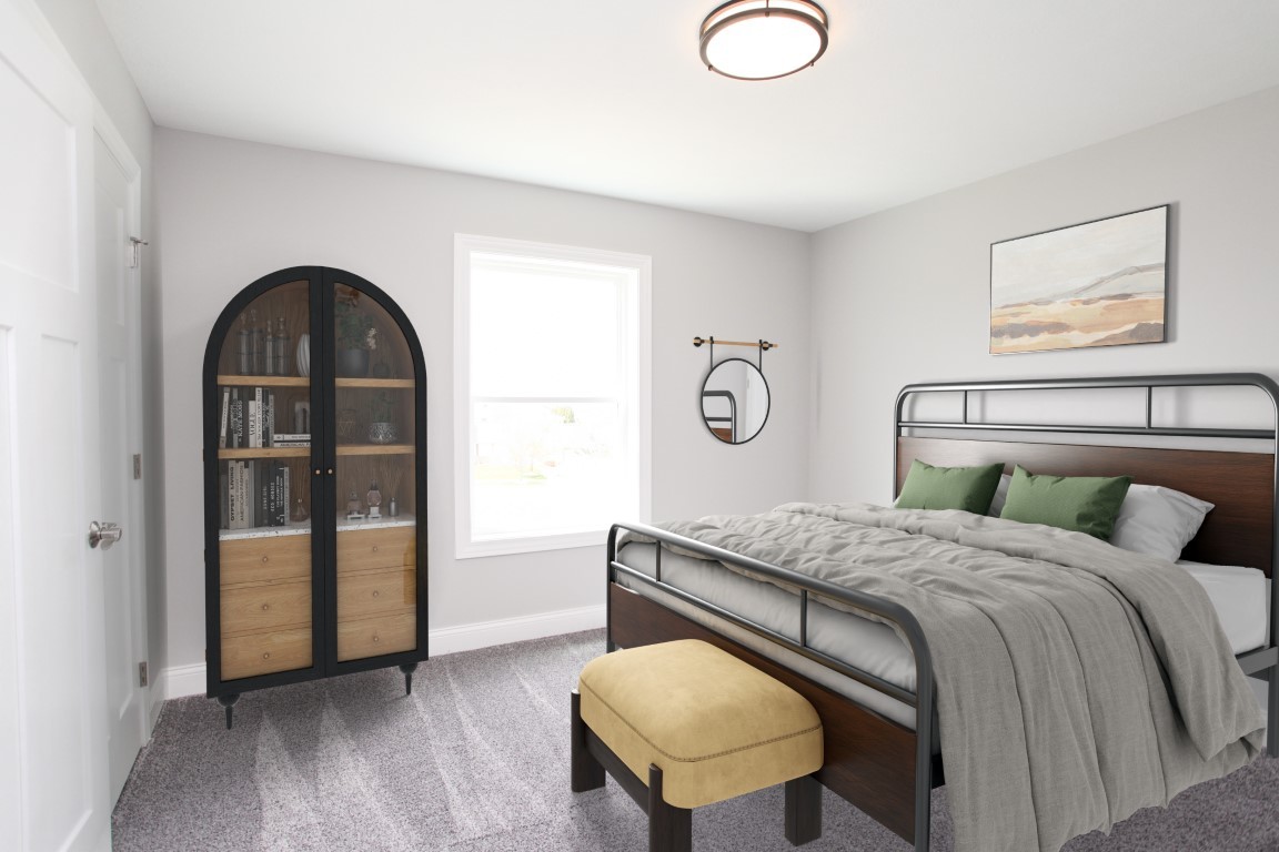 21 Fedor Circle Bloomington, IL 61705 - Photo 6 of 40 a bedroom with a bed and a painting on the wall