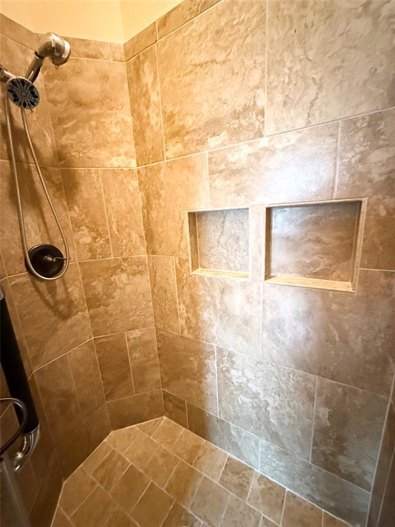 409 Corriente Trail Azle, TX 76020 - Photo 12 of 36 a bathroom with a shower