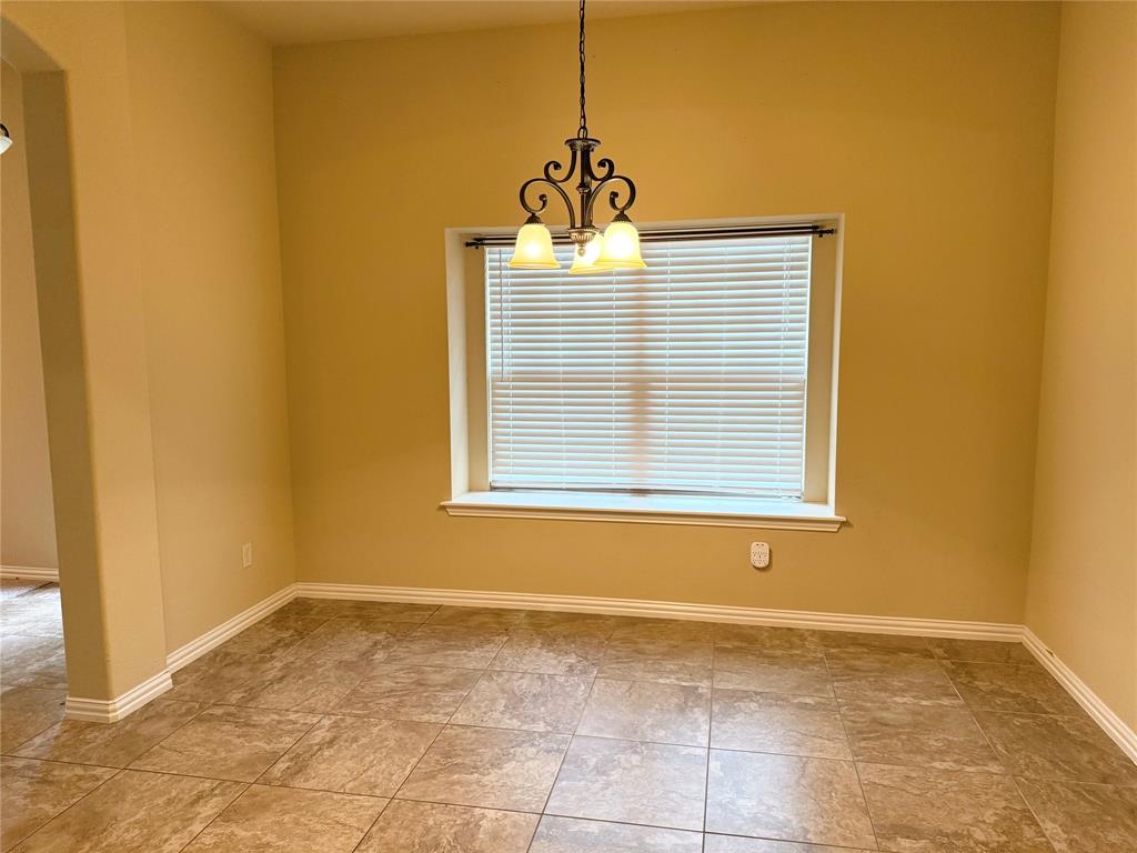 409 Corriente Trail Azle, TX 76020 - Photo 13 of 36 Dining room connected to kitchen