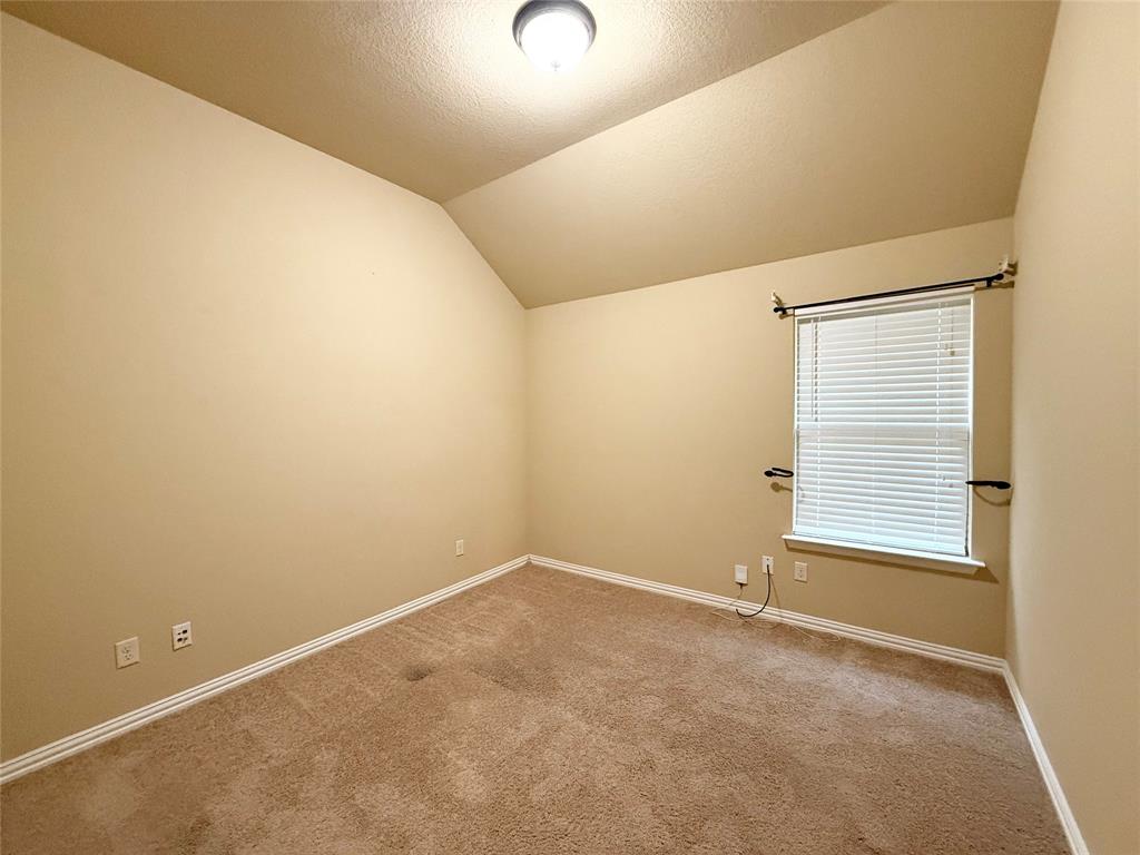 409 Corriente Trail Azle, TX 76020 - Photo 17 of 36 a view of an empty room with a window