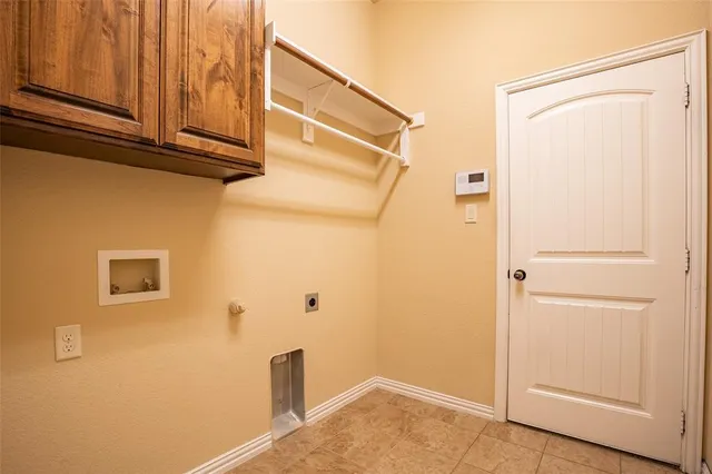 a view of a backyard with large trees