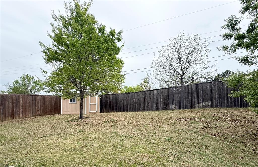 409 Corriente Trail Azle, TX 76020 - Photo 24 of 36 a view of a backyard