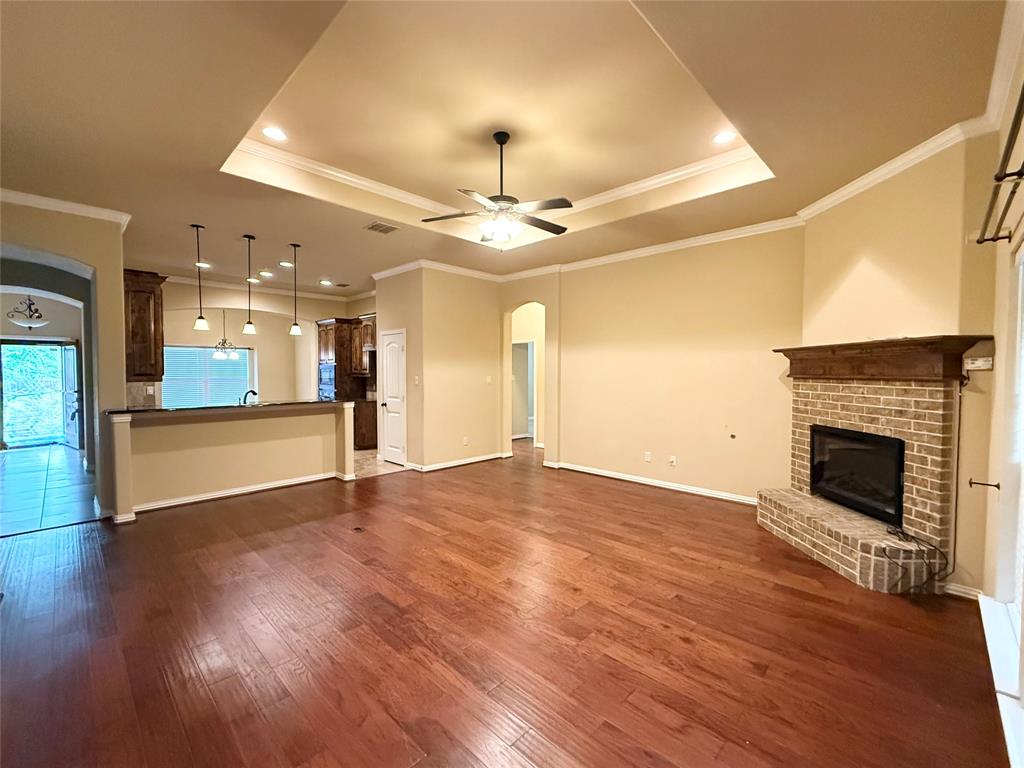 409 Corriente Trail Azle, TX 76020 - Photo 4 of 36 Pass through bar for extra seating and just enough separation.