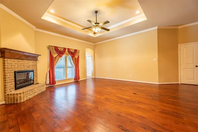 a view of a room with projector and a chandelier