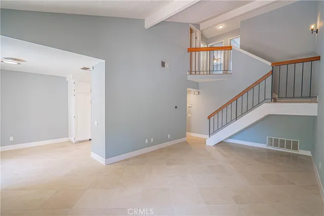 a view of an entryway with stairs