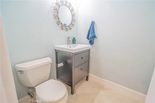 a kitchen with stainless steel appliances a refrigerator and a stove top oven