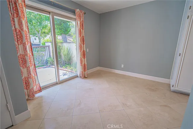 a kitchen with stainless steel appliances granite countertop a refrigerator sink and stove