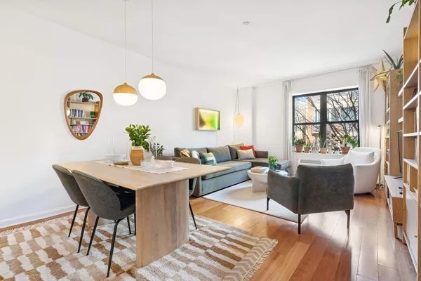 a living room with furniture and window