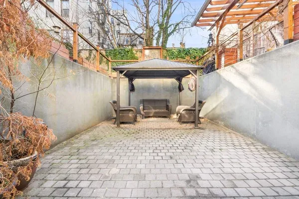 a view of a terrace with furniture