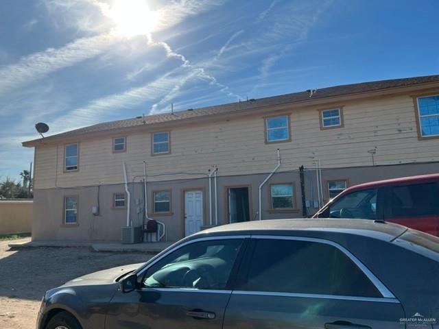 294 Venus Street Rio Grande City, TX 78582 - Photo 2 of 7 Rear view of house featuring central AC