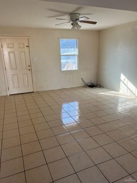 294 Venus Street Rio Grande City, TX 78582 - Photo 4 of 7 Tiled empty room featuring ceiling fan