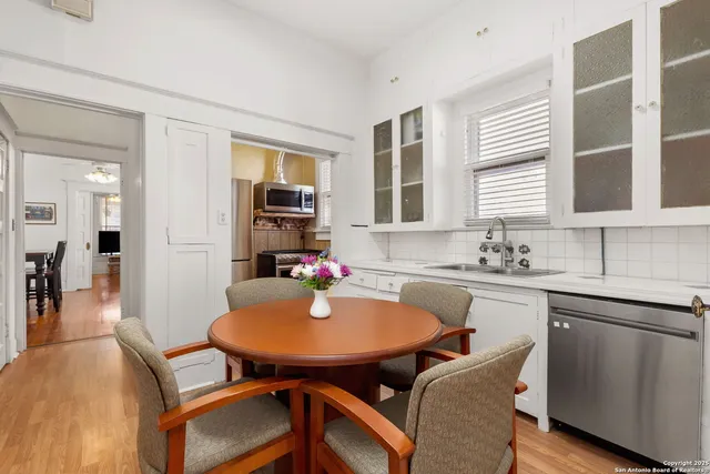 a kitchen with a refrigerator stove and microwave