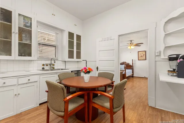 a view of a livingroom with furniture and a flat screen tv
