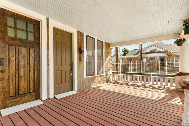 a view of a house with a yard porch and sitting area