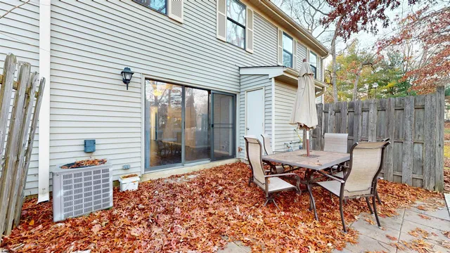 a view of a chairs with a table and chair