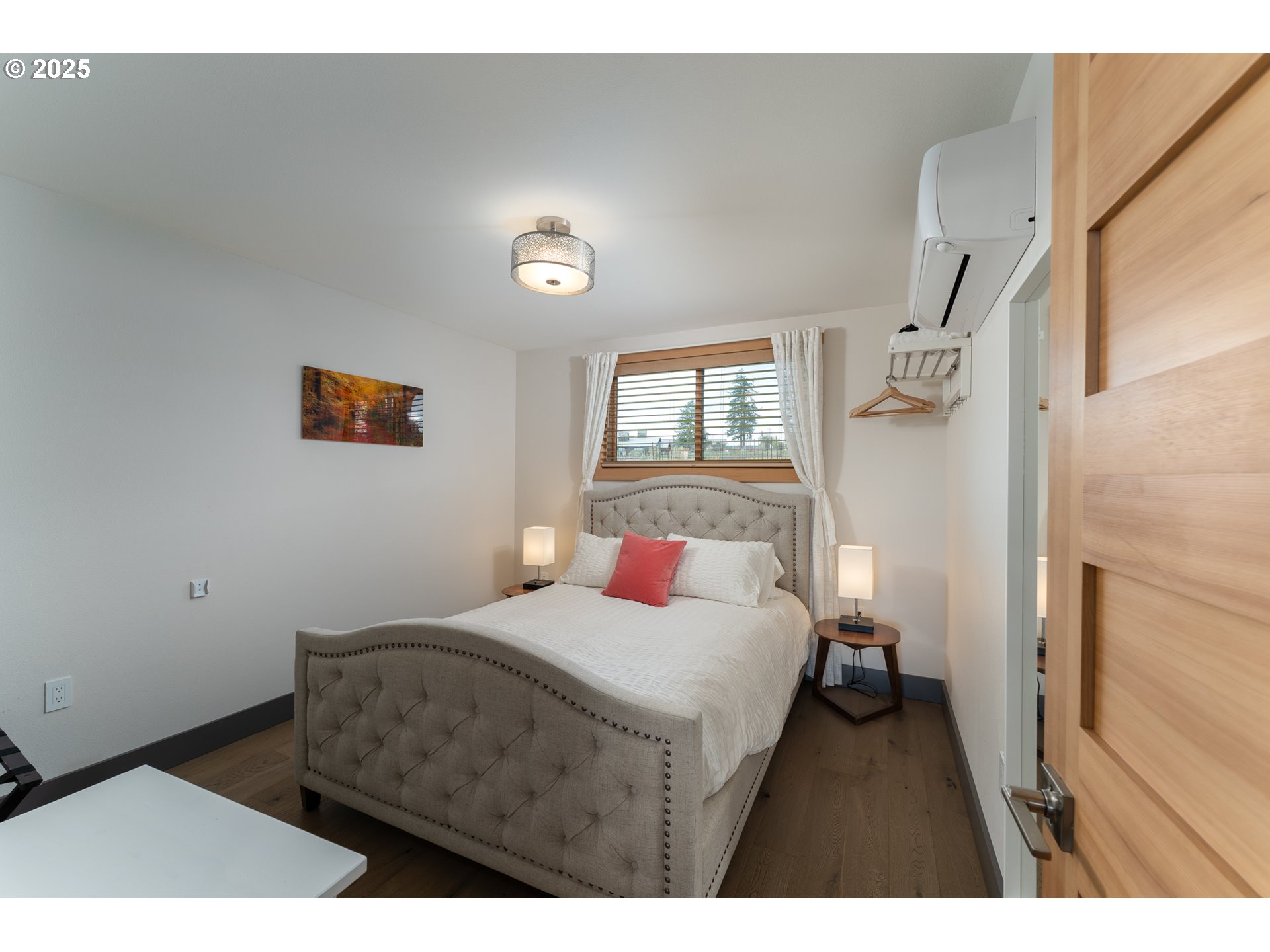 8331 Northeast Worden Hill Road Dundee, OR 97115 - Photo 14 of 48 a bedroom with a bed and a large mirror