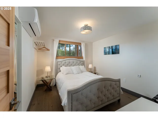a bathroom with a sink mirror and toilet