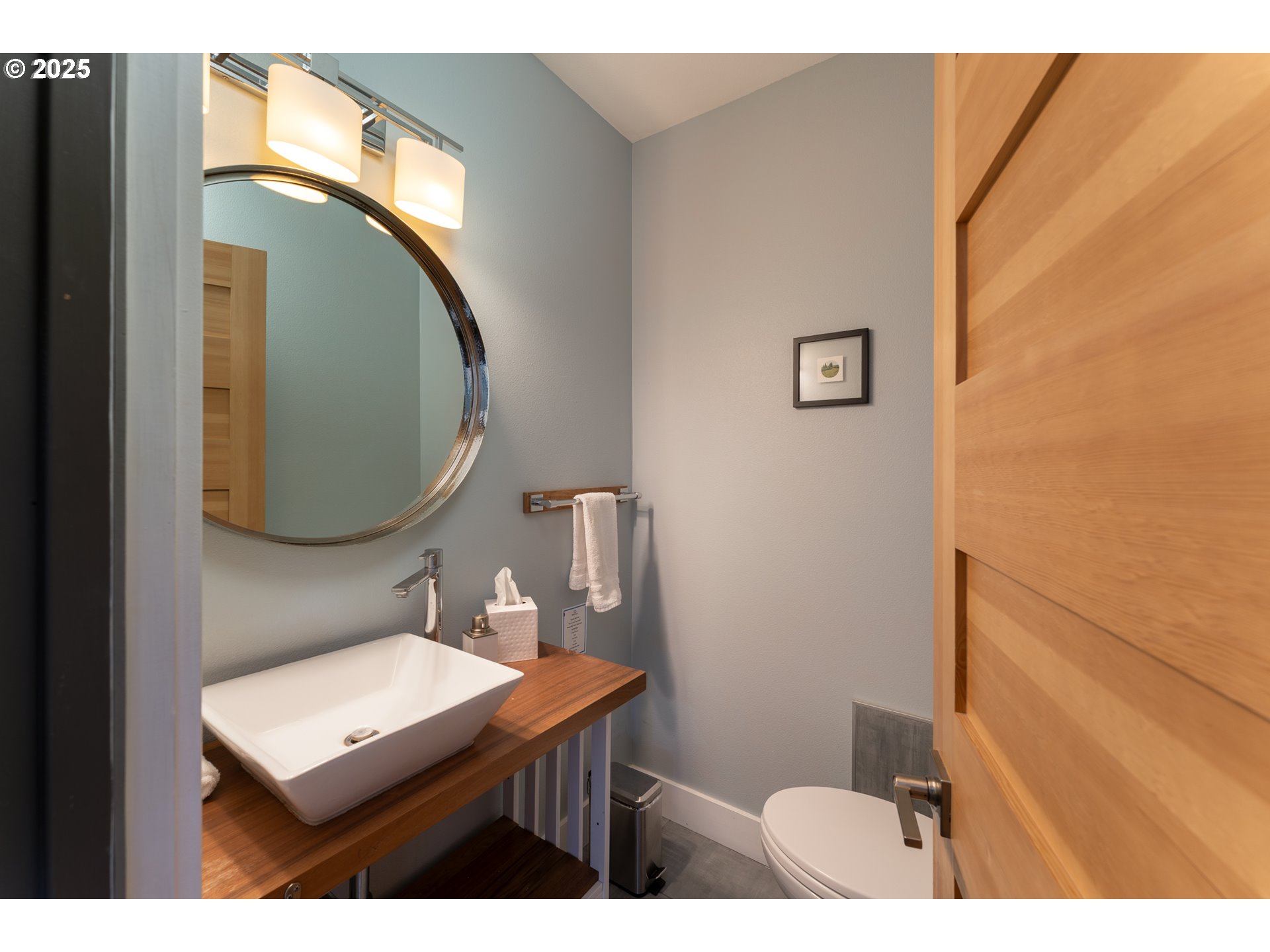 8331 Northeast Worden Hill Road Dundee, OR 97115 - Photo 17 of 48 a bathroom with a sink mirror and toilet