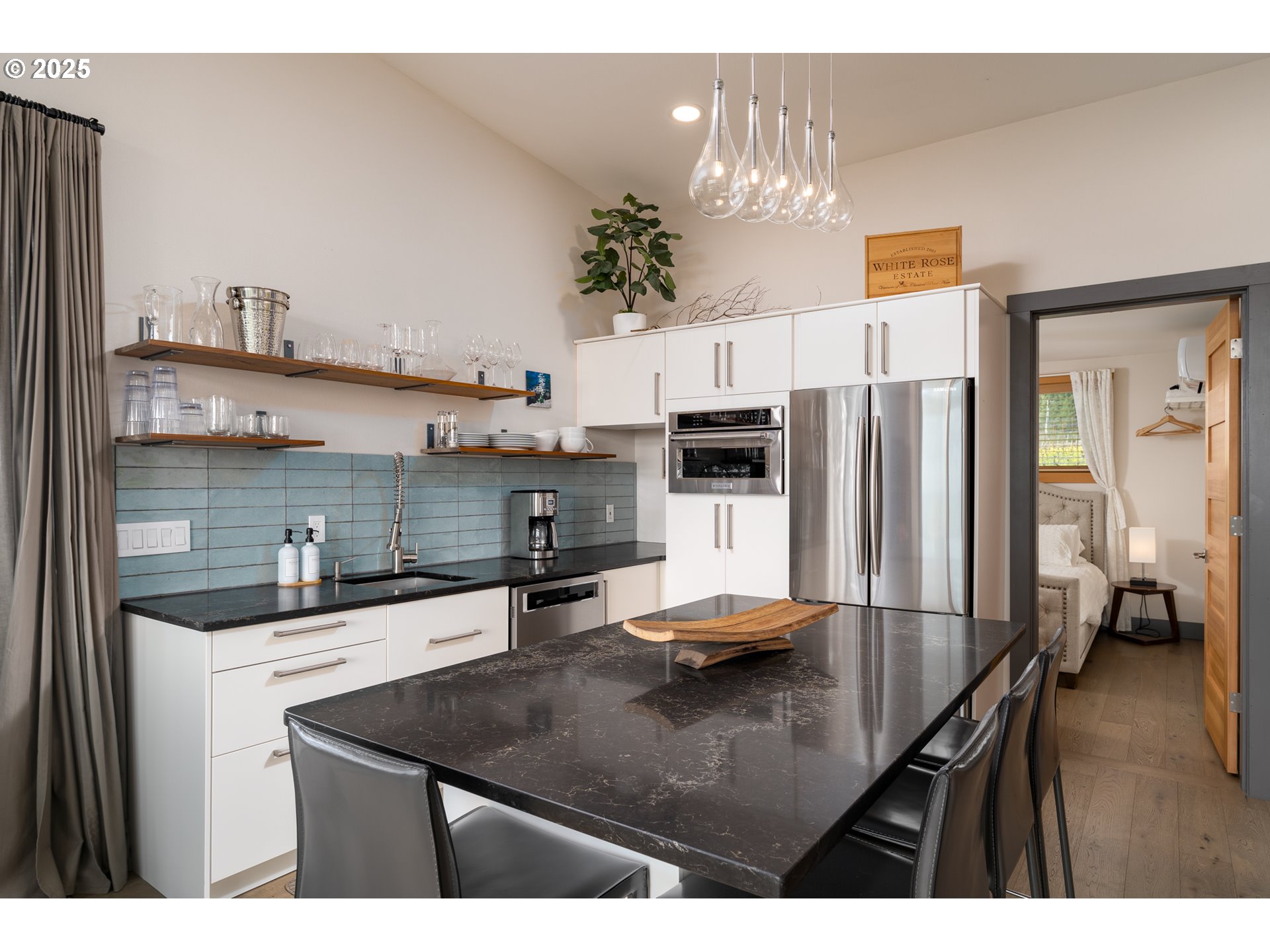 8331 Northeast Worden Hill Road Dundee, OR 97115 - Photo 20 of 48 a kitchen with stainless steel appliances a sink a stove and refrigerator
