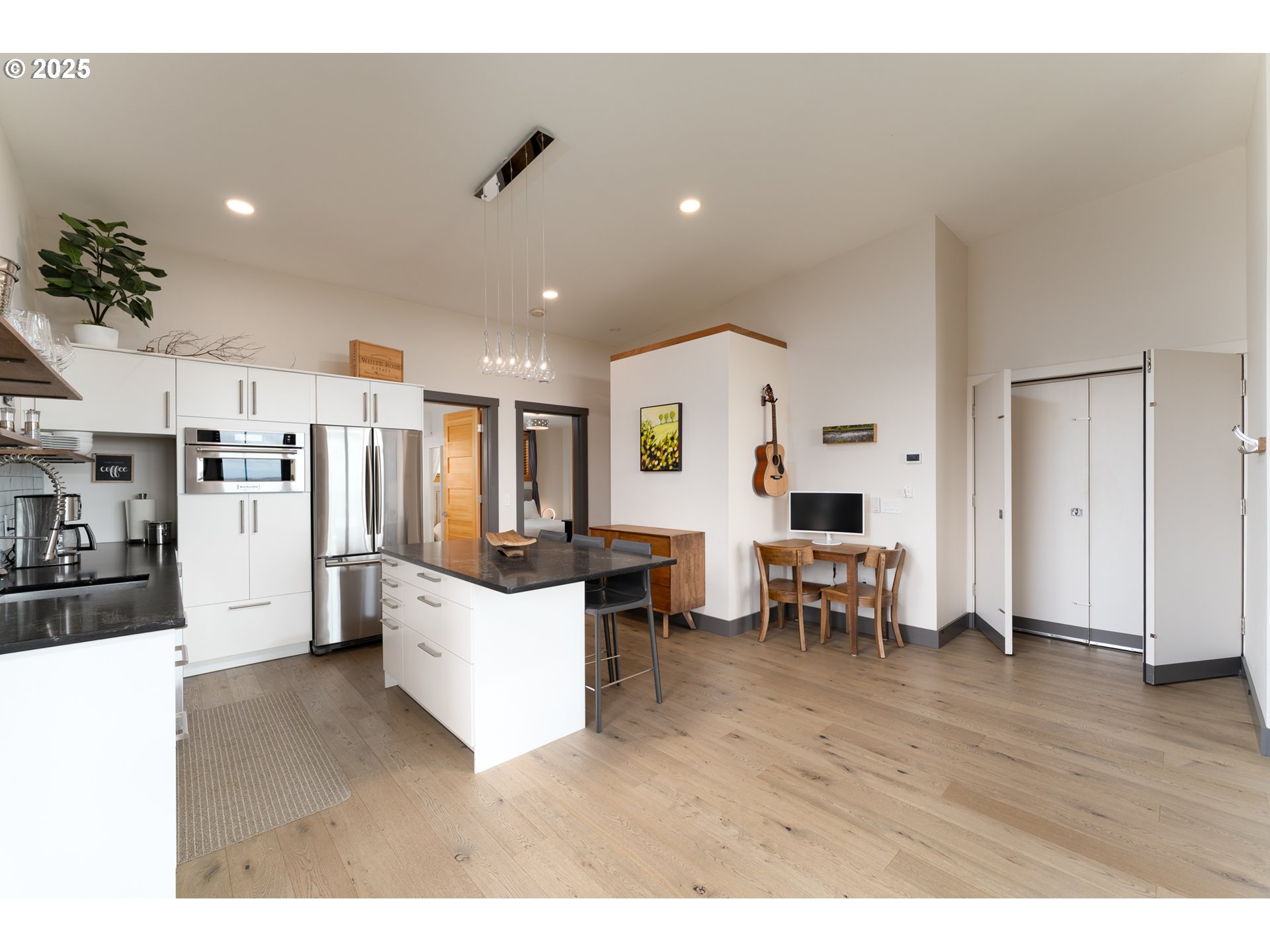 8331 Northeast Worden Hill Road Dundee, OR 97115 - Photo 29 of 48 a living room with lots of furniture and kitchen view