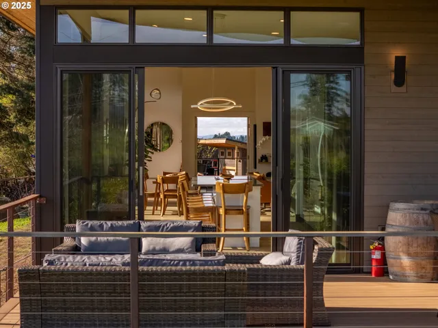a view of living room with furniture and window