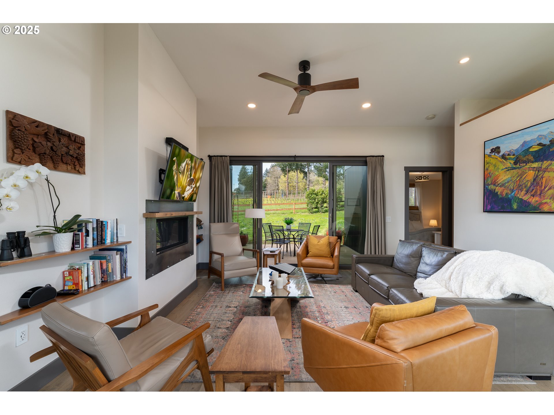 8331 Northeast Worden Hill Road Dundee, OR 97115 - Photo 5 of 48 a living room with furniture and a fireplace
