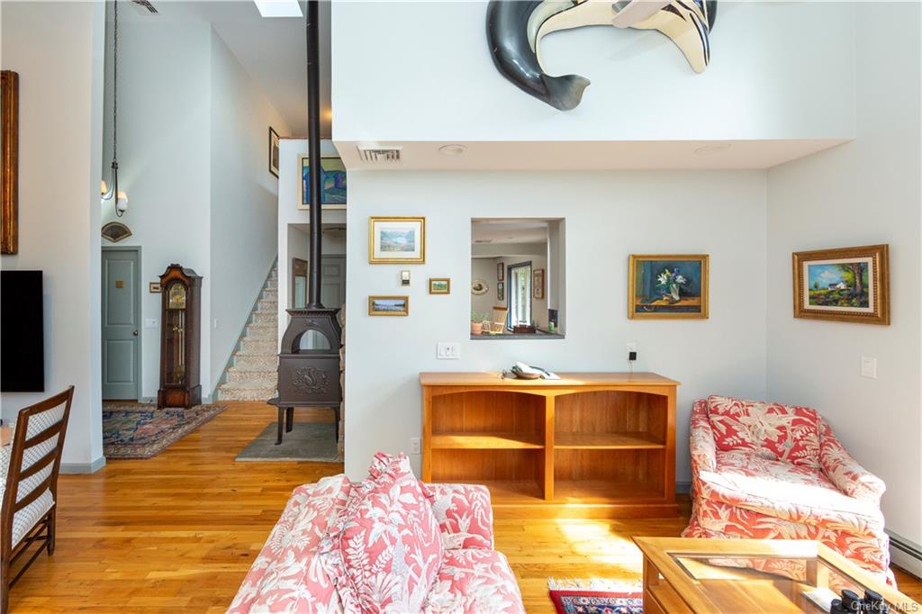 206 Quaker Hill Road Pawling, NY 12564 - Photo 17 of 36 Living room with wood-type flooring and baseboard heating