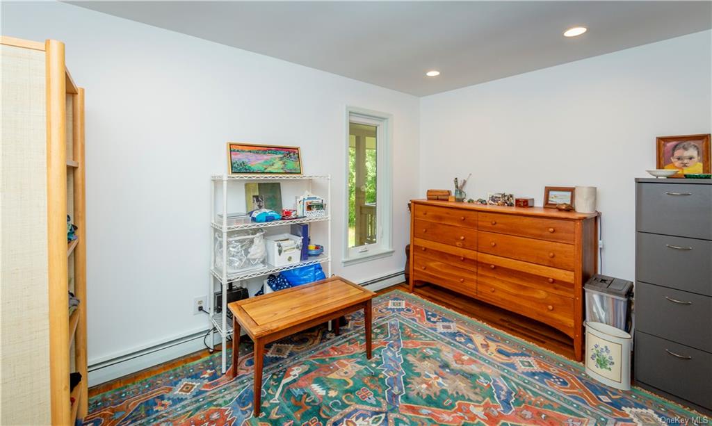 206 Quaker Hill Road Pawling, NY 12564 - Photo 28 of 36 Sitting room with a baseboard heating unit and wood-type flooring