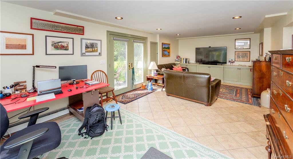 206 Quaker Hill Road Pawling, NY 12564 - Photo 31 of 36 Living room featuring light tile patterned flooring and french doors