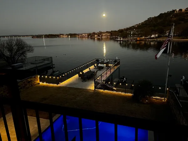 a view of a lake from a balcony