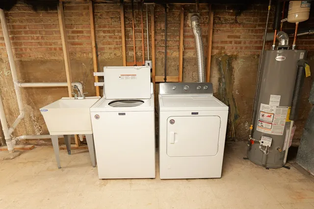 a utility room with dryer and washer