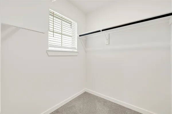 a small space with a window and a window