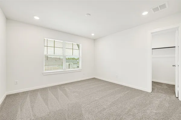 an empty room with a window