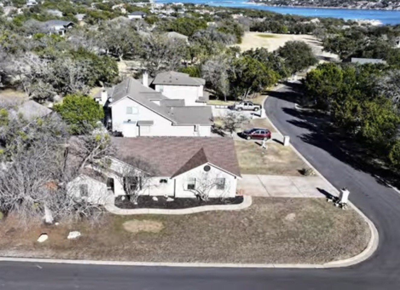 18516 Champions Circle Lago Vista, TX 78645 - Photo 21 of 30 a view of a house with outdoor space