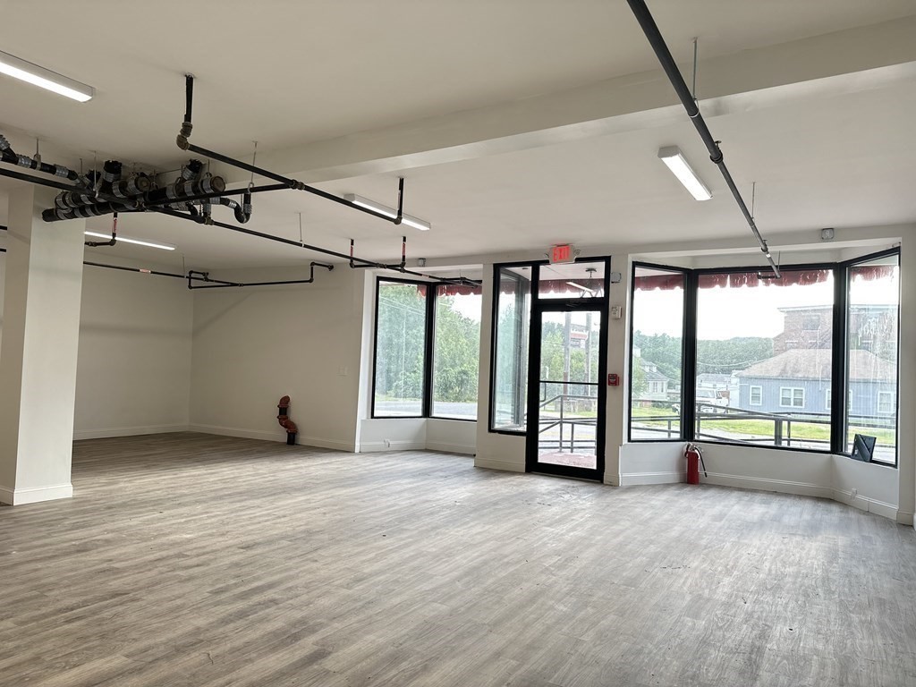 311-313 Providence Road Grafton, MA 01560 - Photo 13 of 21 a view of a livingroom with a large window