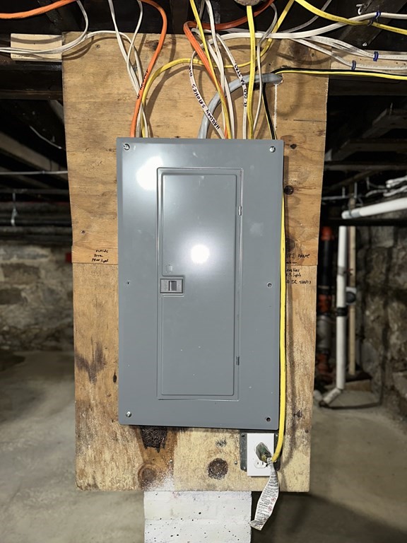 311-313 Providence Road Grafton, MA 01560 - Photo 21 of 21 a bathroom with a sink and a mirror