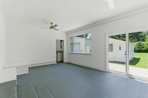 an empty room with windows