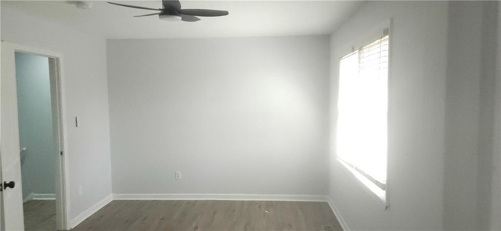 5582 Windwood Road Atlanta, GA 30349 - Photo 15 of 29 a view of a room with a window