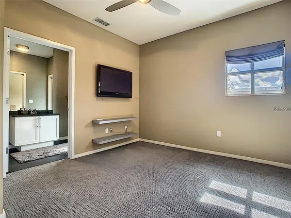 a view of a livingroom with a flat screen tv