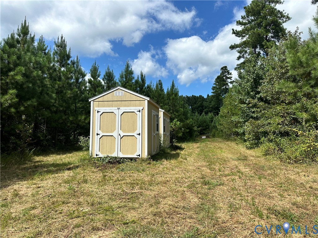 0 Loman Road Meherrin, VA 23954 - Photo 11 of 12 a view of a house with a yard