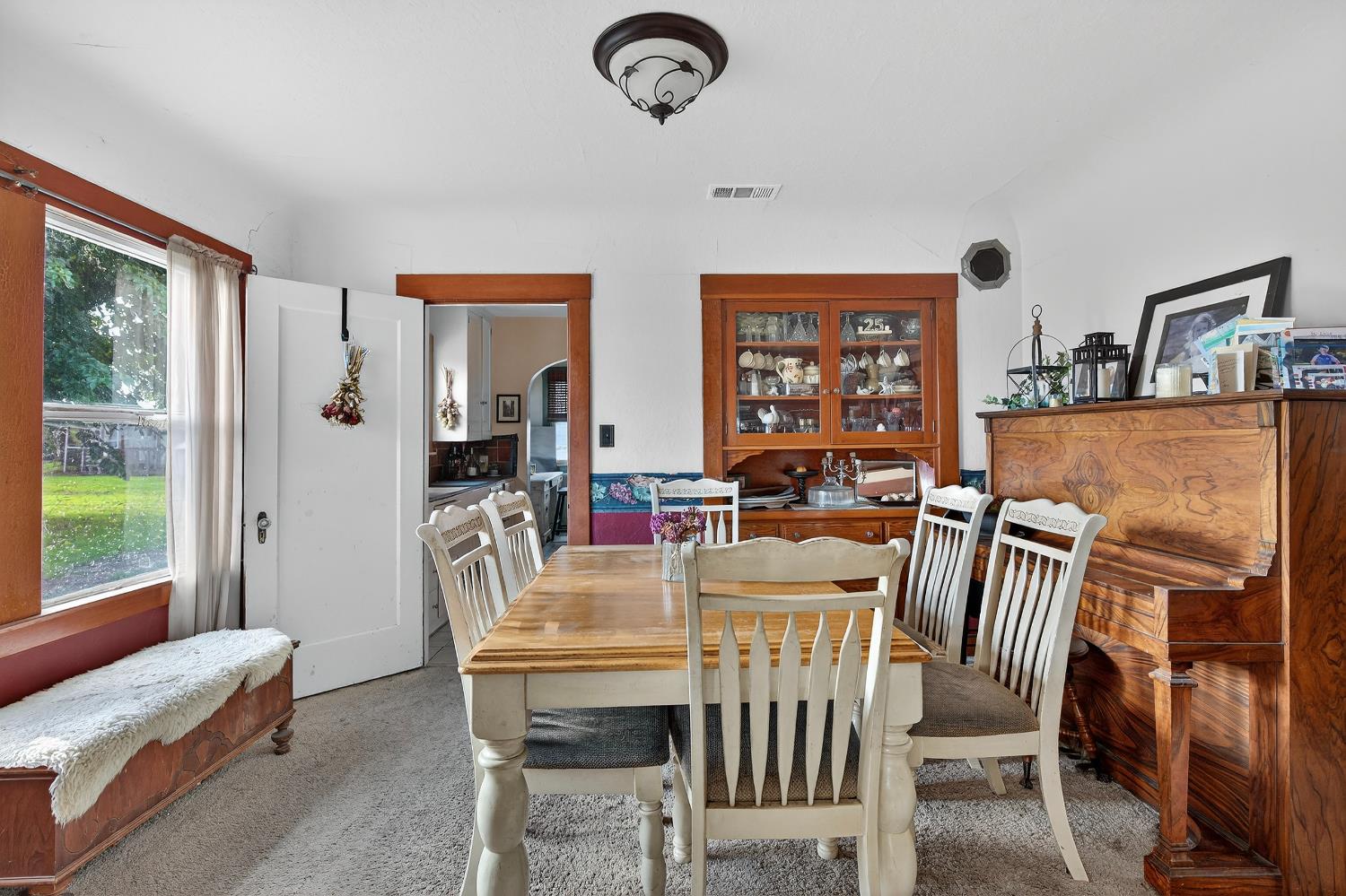 28015 Blossom Road Thornton, CA 95686 - Photo 17 of 34 a view of a dining room with furniture window and outside view