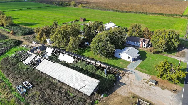 an aerial view of a house with a garden