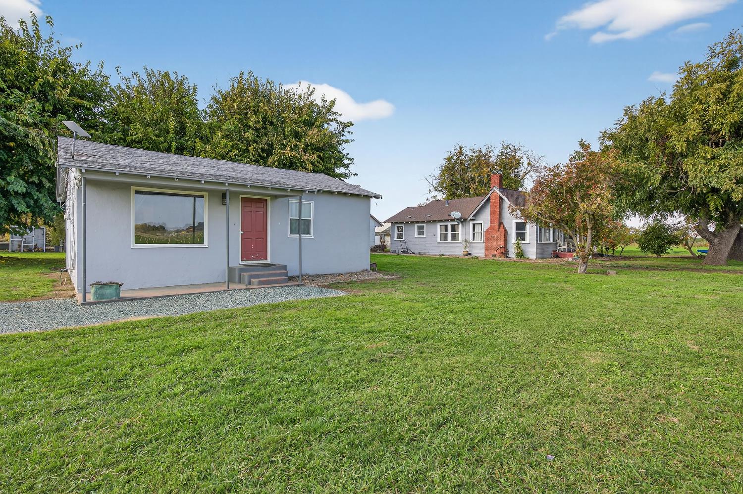 28015 Blossom Road Thornton, CA 95686 - Photo 3 of 34 a house view with a garden space