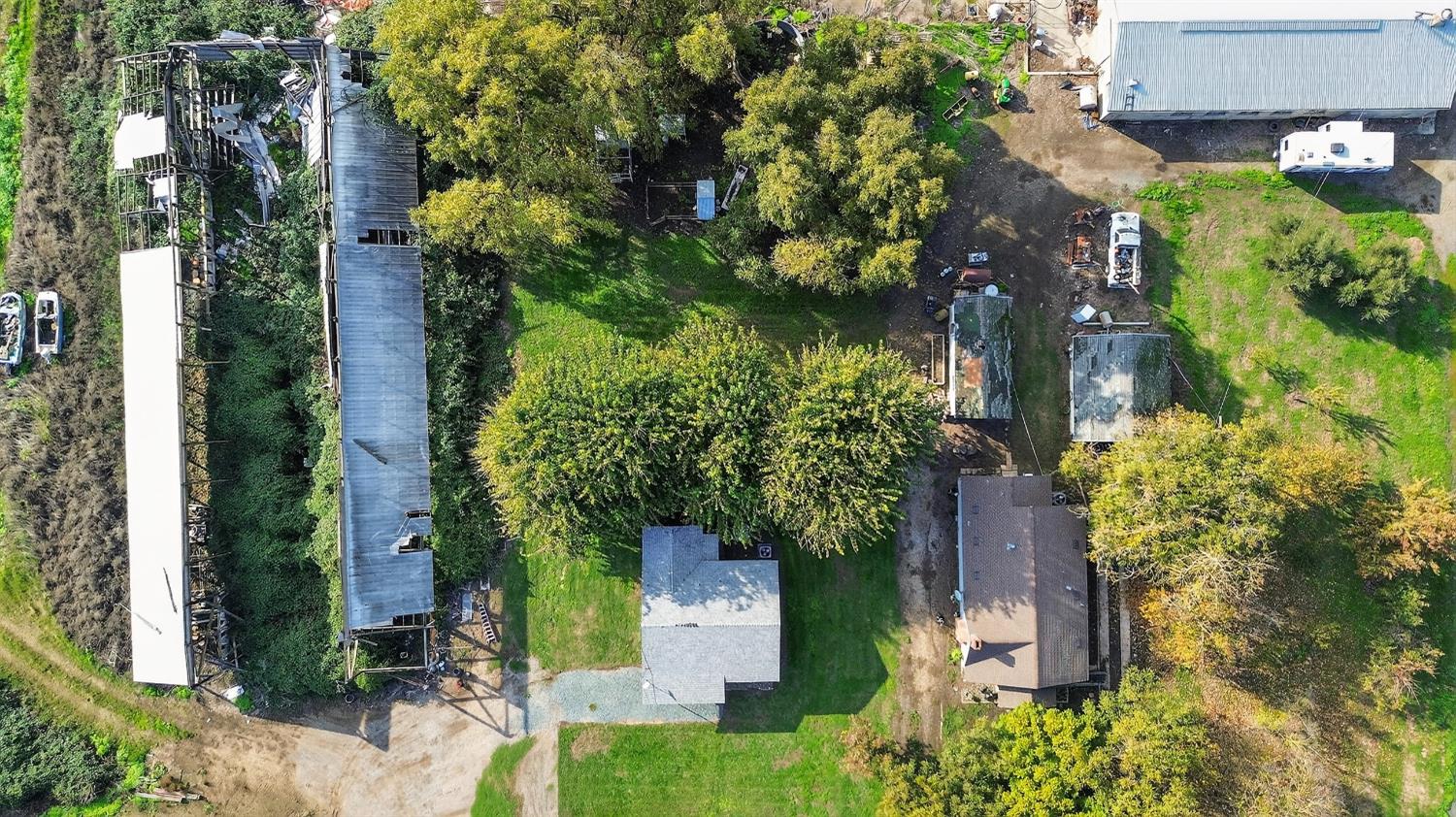 28015 Blossom Road Thornton, CA 95686 - Photo 32 of 34 an aerial view of residential house with outdoor space and trees all around