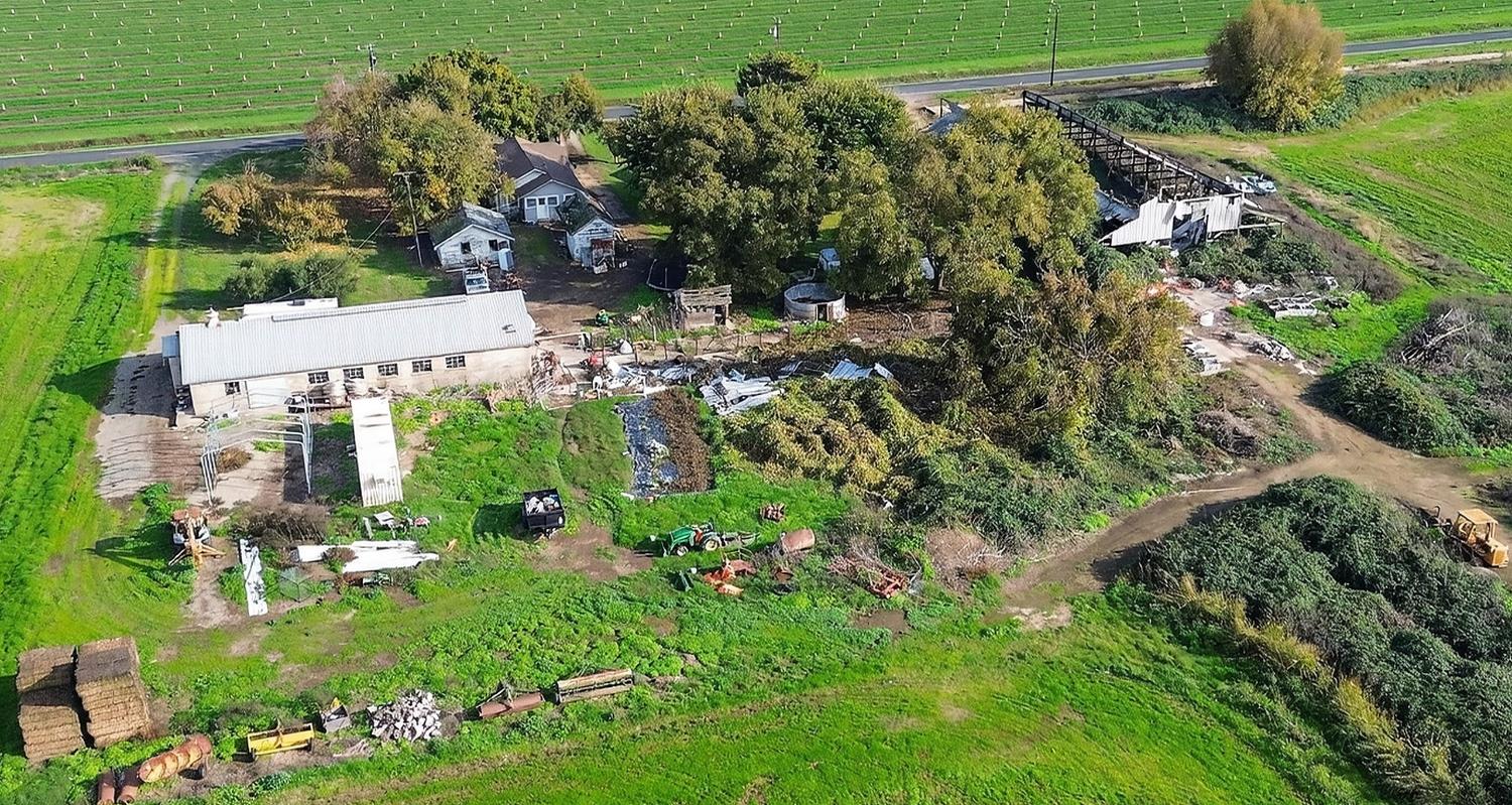 28015 Blossom Road Thornton, CA 95686 - Photo 34 of 34 an aerial view of residential house with outdoor space and trees all around