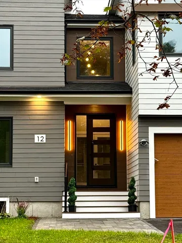 a view of a house with a door and a window