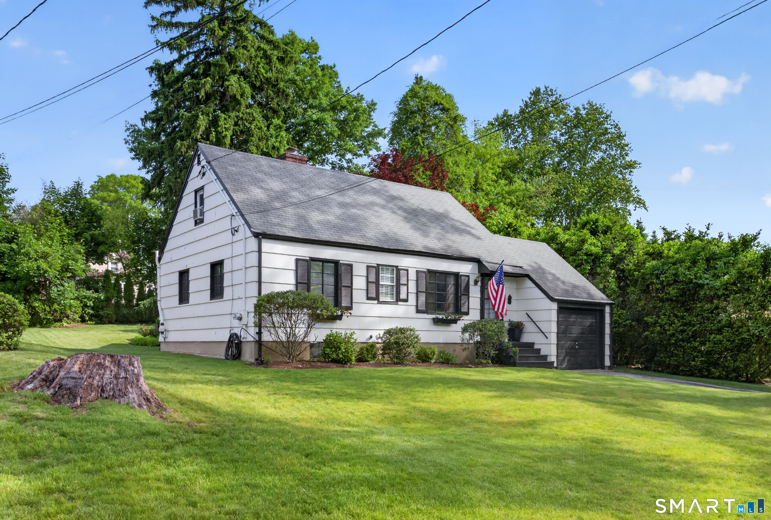 68 Old Elm Road Fairfield, CT 06825 - Photo 3 of 40 a aerial view of a house with a yard table and chairs