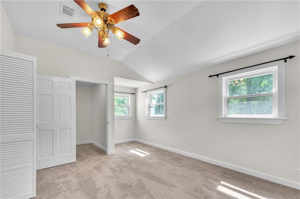 116 Purvis Lane Valencia, PA 16059 - Photo 26 of 49 an empty room with windows and fan