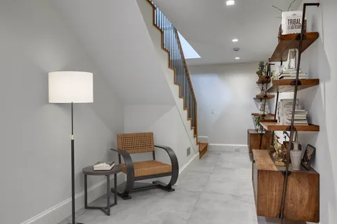 a view of entryway with livingroom and furniture