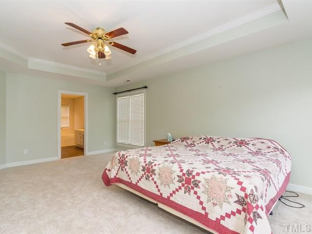 115 Jersey Ridge Road Cary, NC 27518 - Photo 17 of 25 MAster bedroom is 20x14 with trey ceiling and ceiling fan. Master Suite